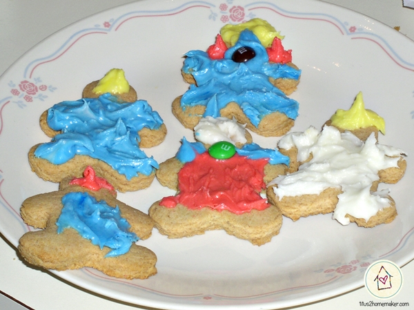 healthy Purim cookies -- decorated as Haman, Mordecai, Esther, etc.