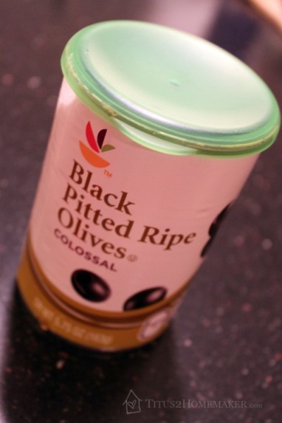 putting a lid on a can