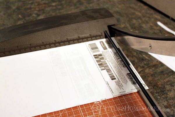 Cutting Coupons on a Guillotine-Style Paper Trimmer at Titus 2 Homemaker  #t2hmkr #frugality
