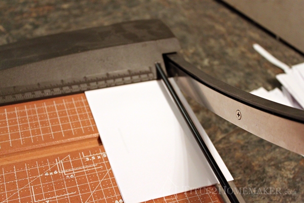Cutting Coupons on a Guillotine-Style Paper Trimmer at Titus 2 Homemaker  #t2hmkr #frugality