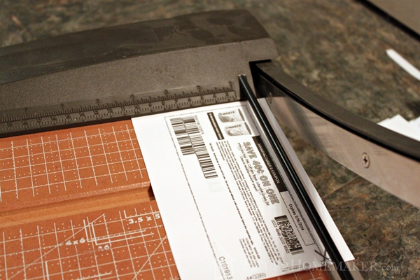 Cutting Coupons on a Guillotine-Style Paper Trimmer at Titus 2 Homemaker  #t2hmkr #frugality