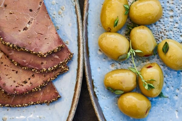 sliced beef and green olives